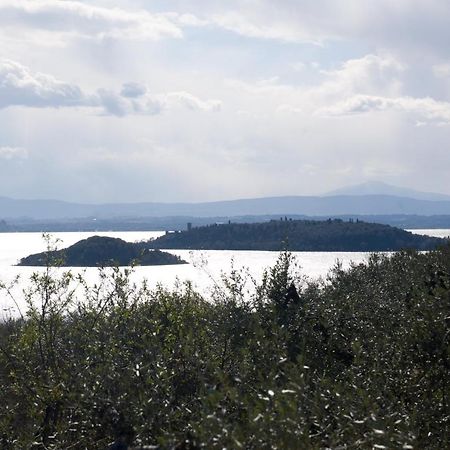 Antico Casale Tiravento Aparthotel Passignano sul Trasimeno Buitenkant foto