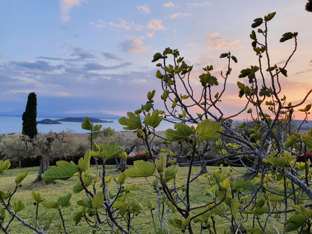 Antico Casale Tiravento Aparthotel Passignano sul Trasimeno Buitenkant foto