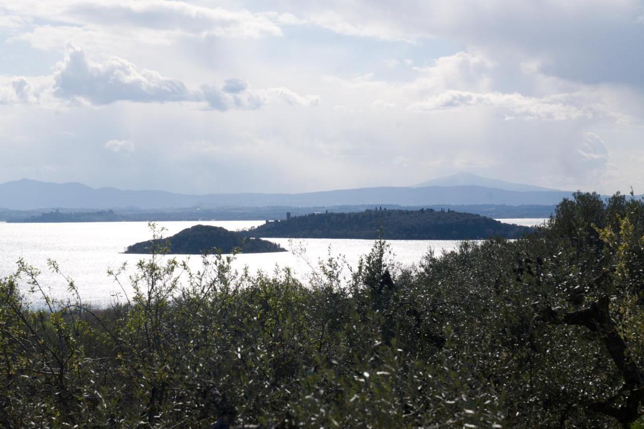 Antico Casale Tiravento Aparthotel Passignano sul Trasimeno Buitenkant foto