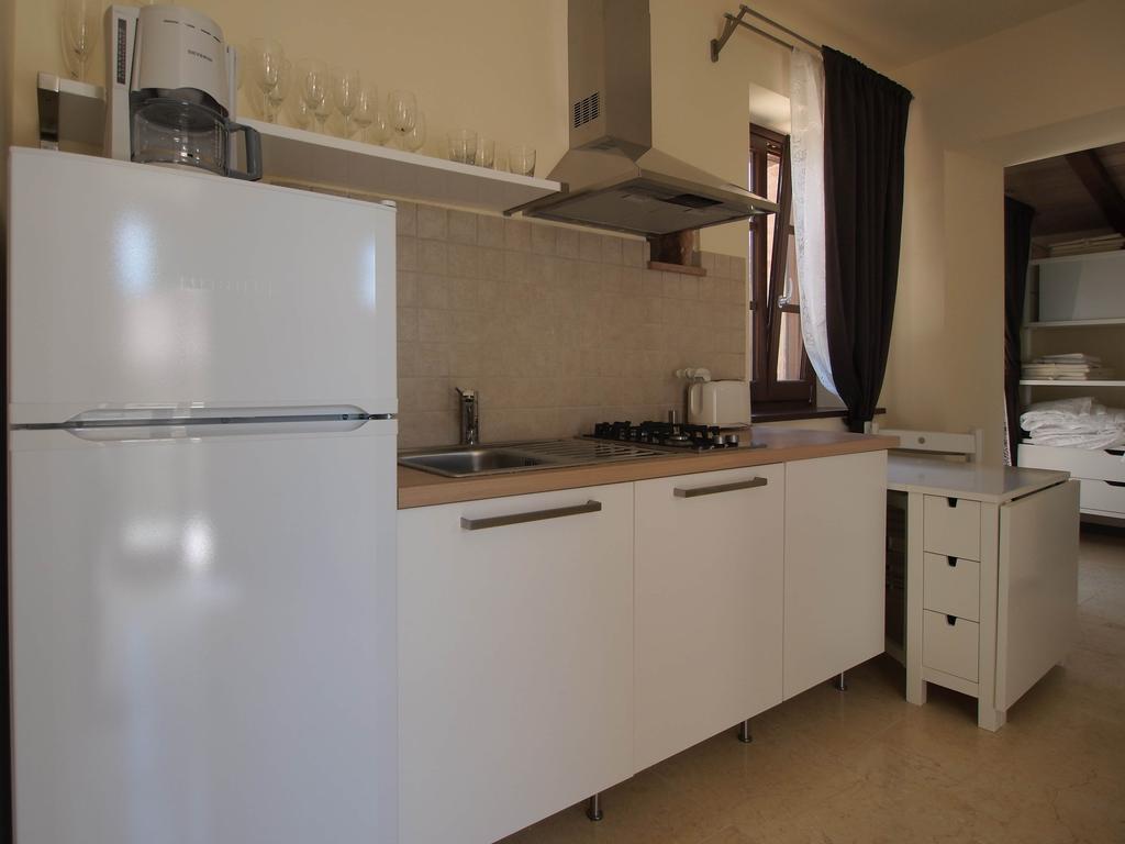 Antico Casale Tiravento Aparthotel Passignano sul Trasimeno Kamer foto