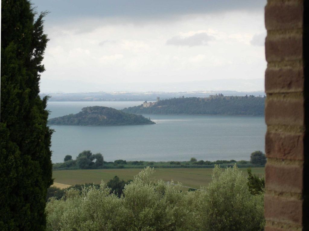 Antico Casale Tiravento Aparthotel Passignano sul Trasimeno Kamer foto