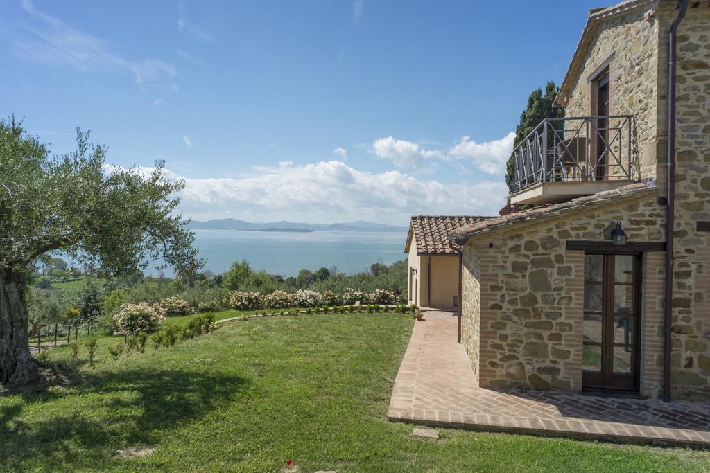 Antico Casale Tiravento Aparthotel Passignano sul Trasimeno Buitenkant foto